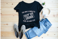 Rolled Gildan 5000 Adult Unisex T-Shirt in various colors displayed Navy and Black.